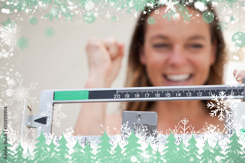 Composite image of scale showing weight loss against snow