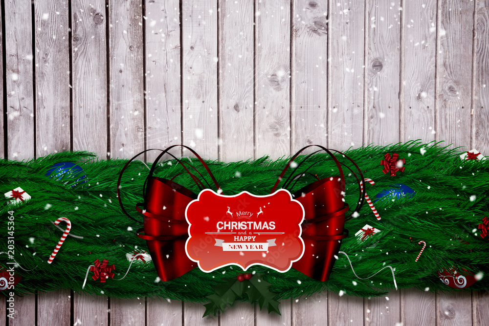 Composite image of fir branch christmas decoration garland  against digitally generated grey wooden 