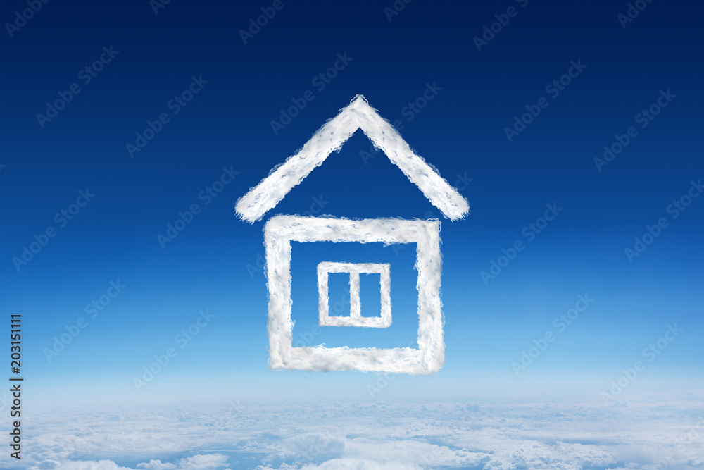 Cloud house against blue sky over clouds at high altitude