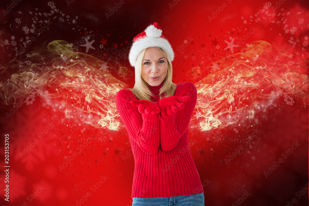 Happy festive blonde  against blurred snowflake design