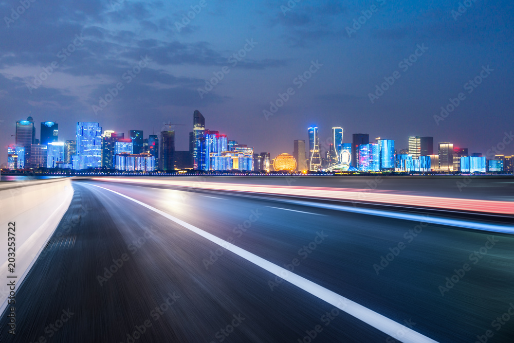 empty asphalt road with modern building in urban