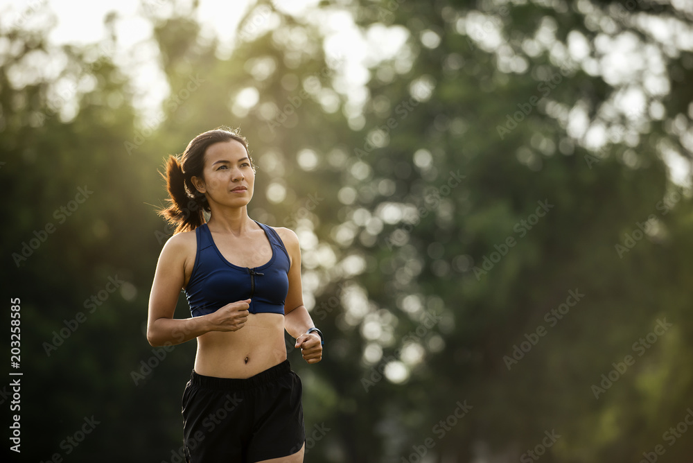 young asia woman jogging