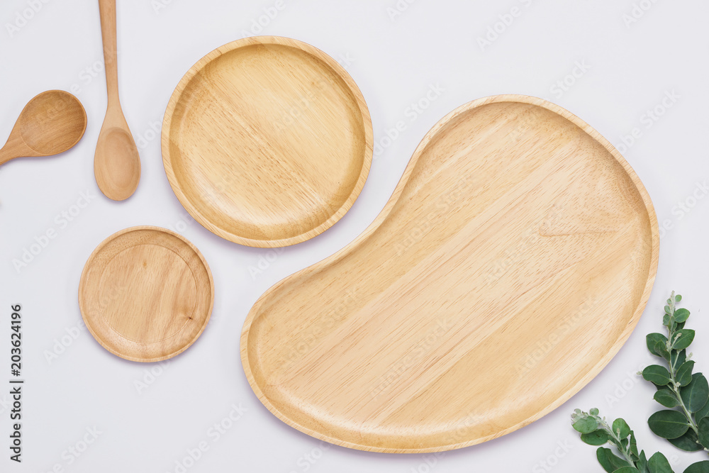 Set of wooden plates on the white background