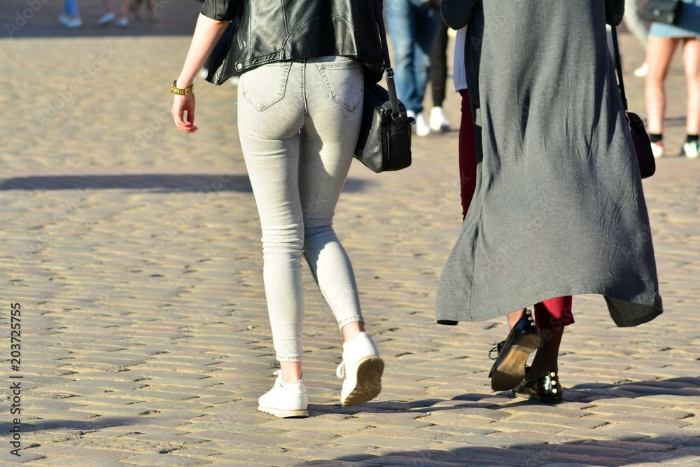 People walking on big city street, blurred motion crossing abstract