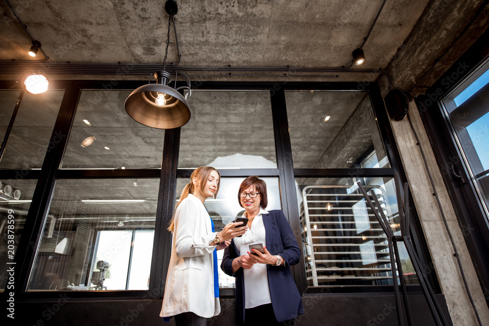 Bakery office with business women talking together