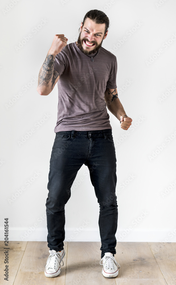 Portrait of tattooed man isolated