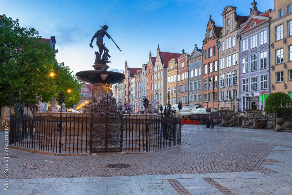 Fountain of the Neptune in old town of Gdansk at dawn, Poland