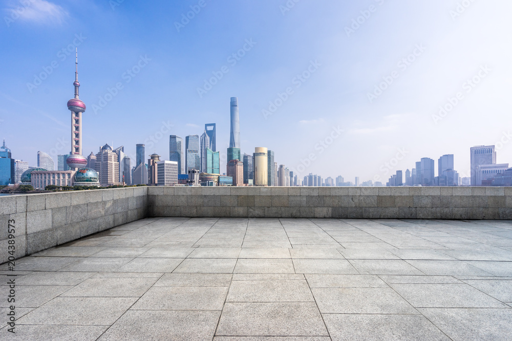 panoramic city skyline with empty floor