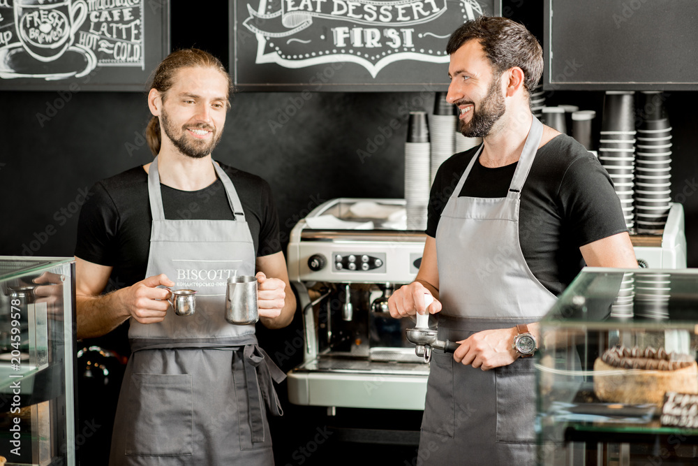 Two baristas in the coffee shop