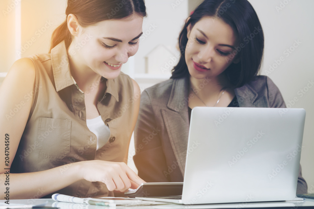 Business Woman Talk to Her Colleague in the Office