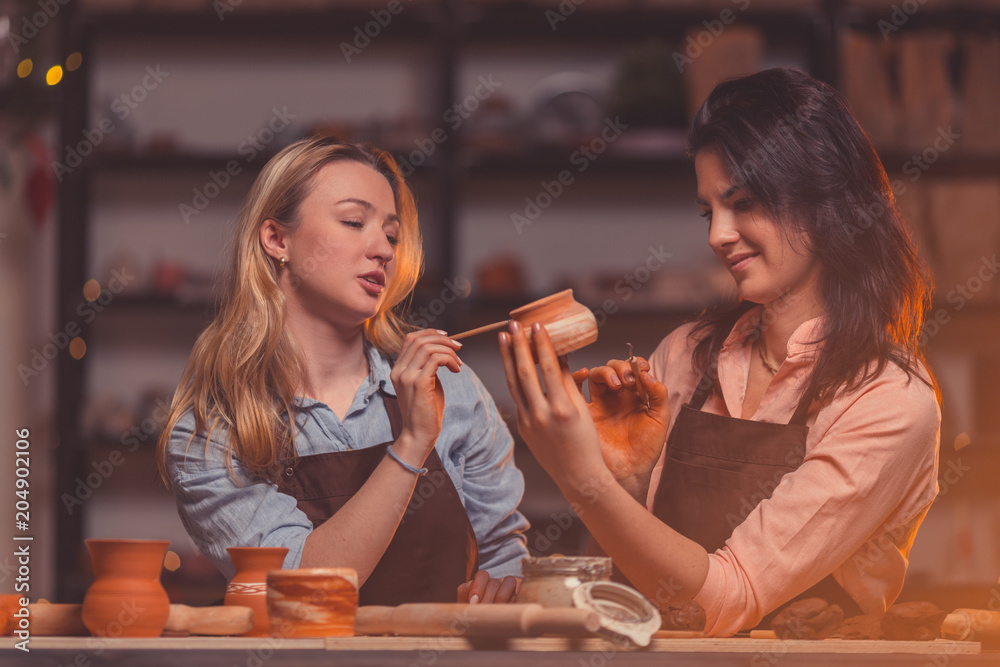 Young women in a pottery studio