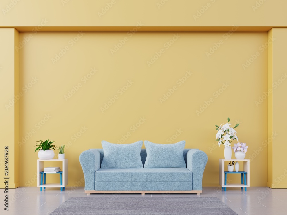 Modern living room interior yellow wall mockup with blue sofa, shelf, flower, and book on empty back