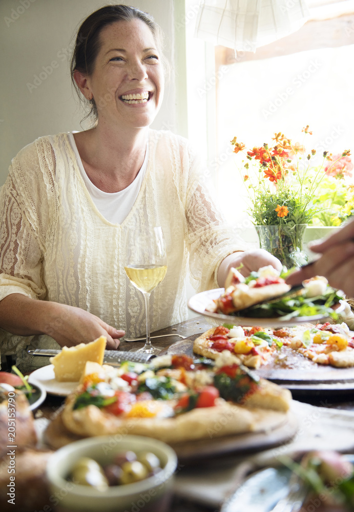 Woman enjoying a pizza dinner