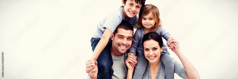 Parents giving children piggyback rides