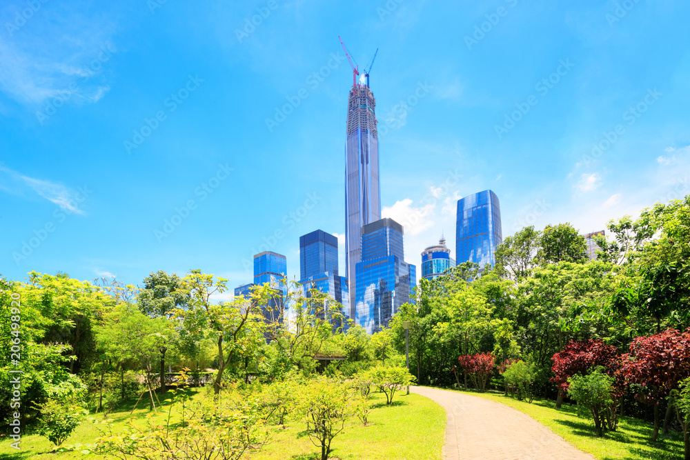 road of a modern city with skyscrapers as background