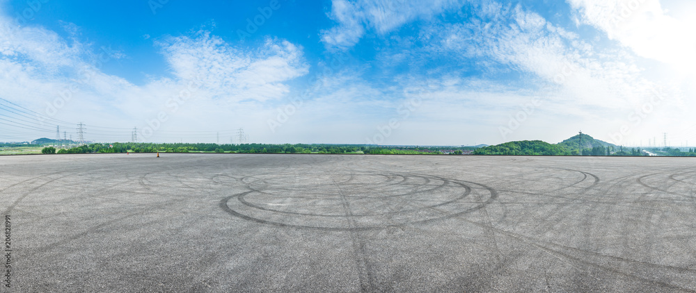 Empty asphalt square road under the blue sky,panoramic view