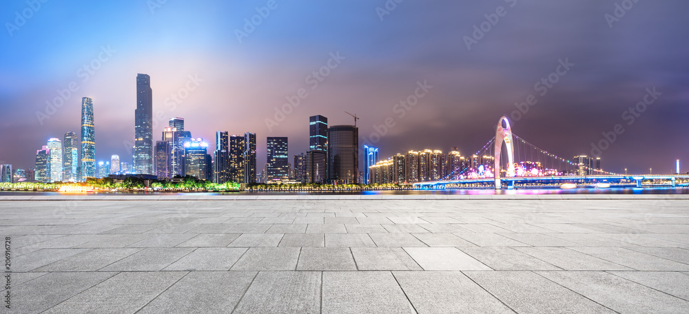 empty square floors and modern city skyline in Guangzhou at night,China