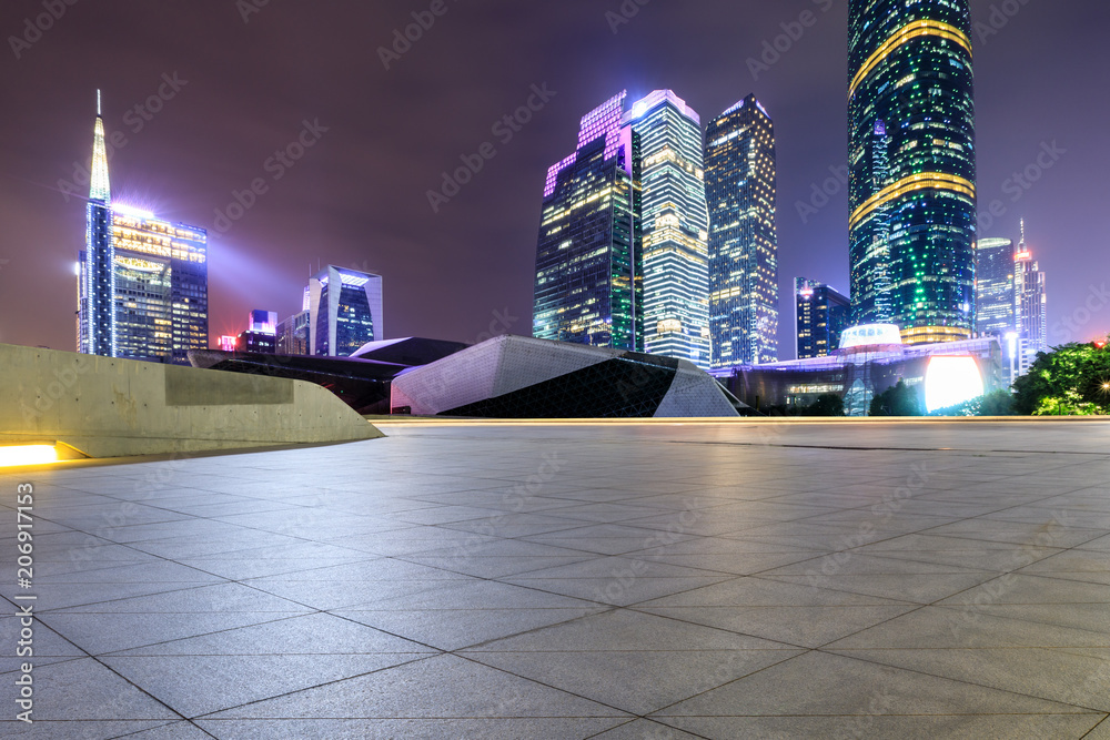 empty square floors and modern city skyline in Guangzhou at night,China