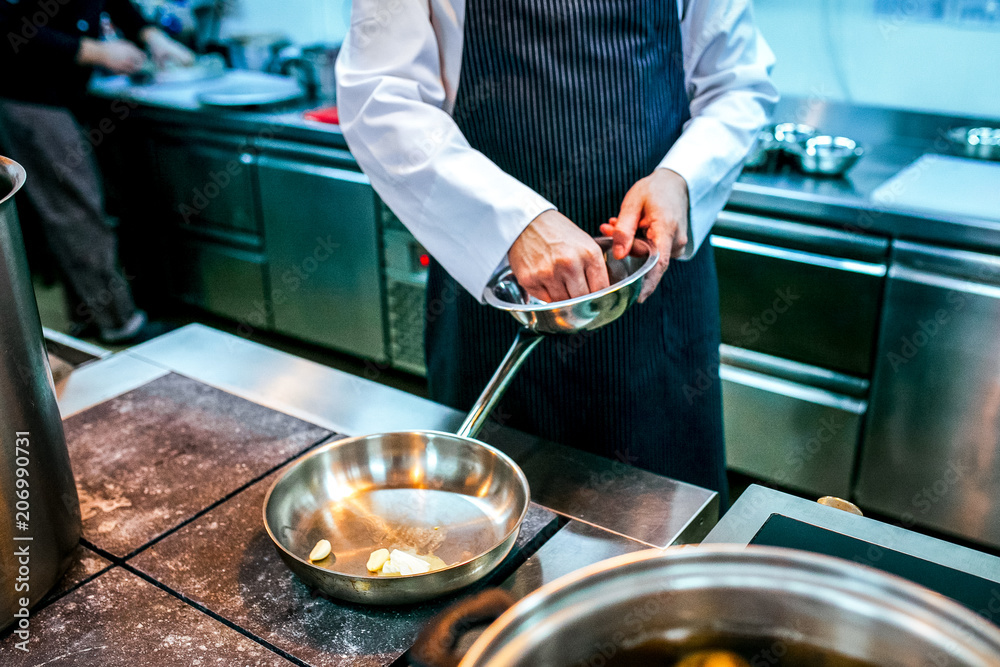 Chef preparing food in the kitchen