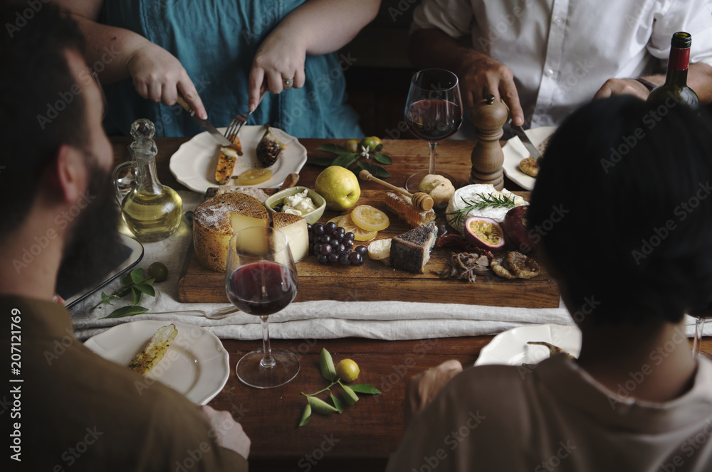 People enjoying a cheese platter food photography recipe idea