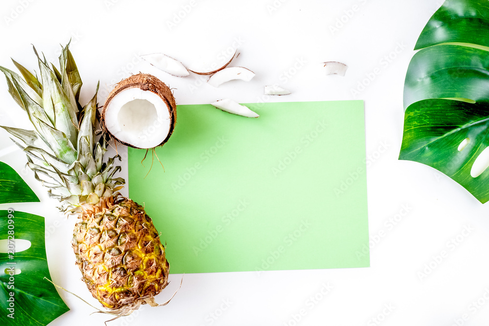 summer mix with pineapple and coconut white background top view 