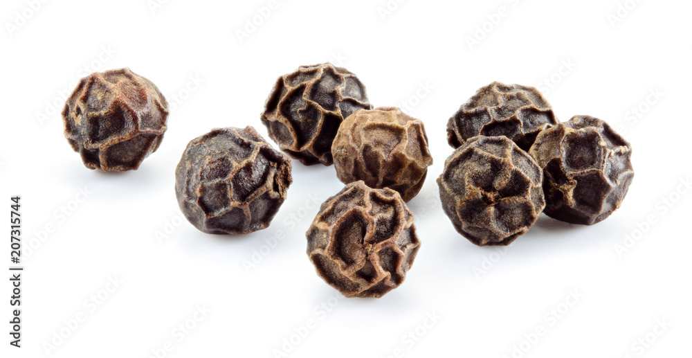 Black pepper. Peppercorn isolated on white. Macro. Full depth of field.