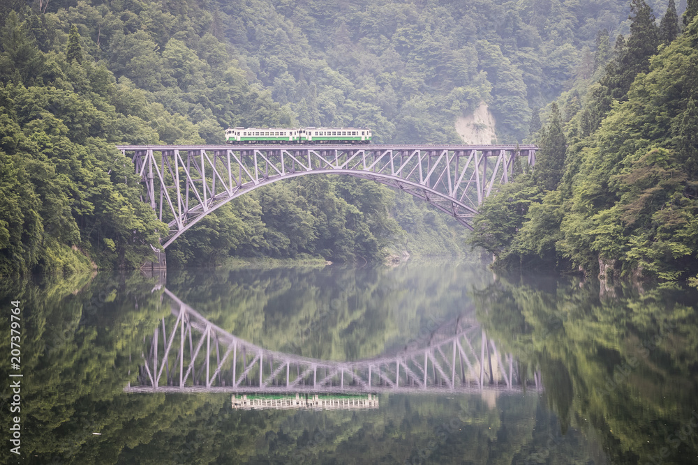 Tadami railway line and Tadami River in summer season at Fukushima prefecture.