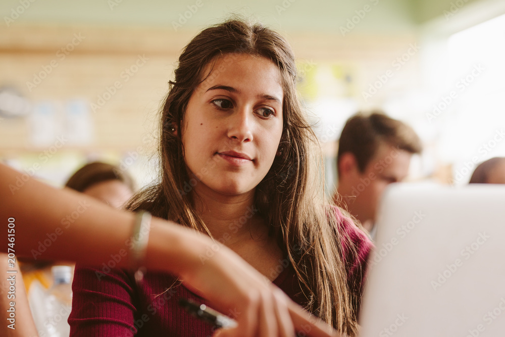 Student listening to the instruction from teacher