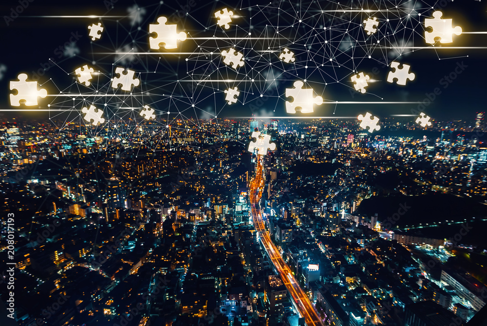 Puzzle Pieces with aerial view of Tokyo, Japan at night