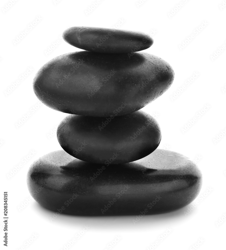 Stack of spa stones on white background