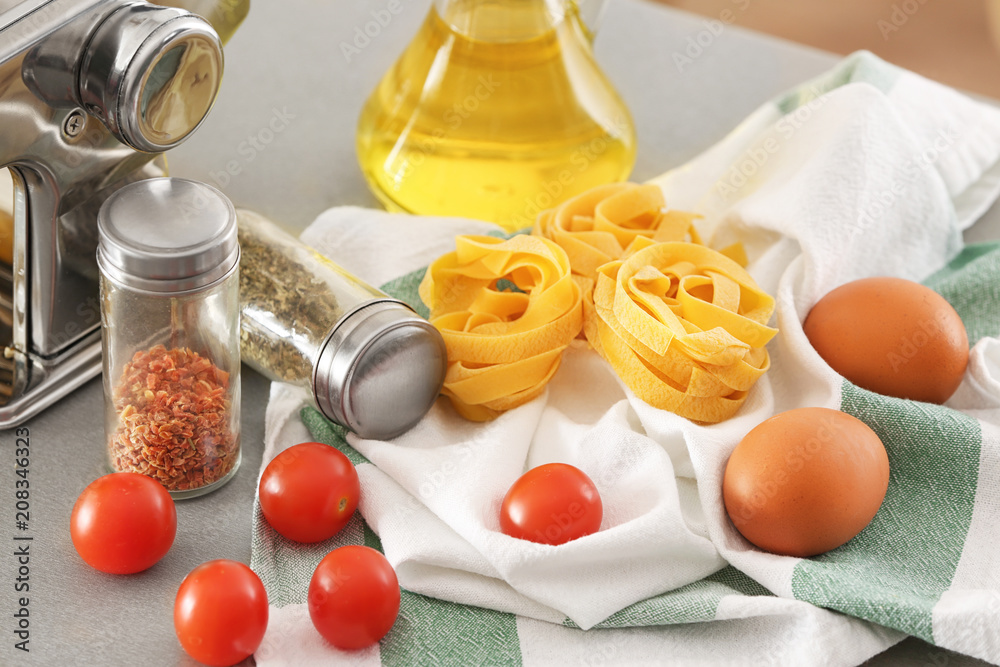 Uncooked fettuccine pasta on kitchen table