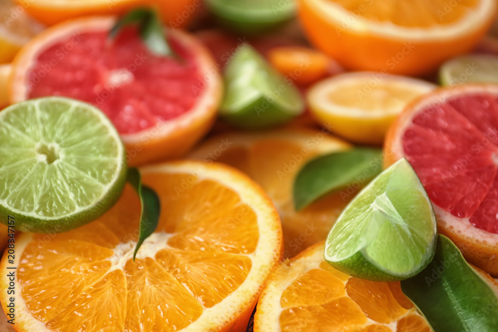 Slices of fresh citrus fruits, closeup