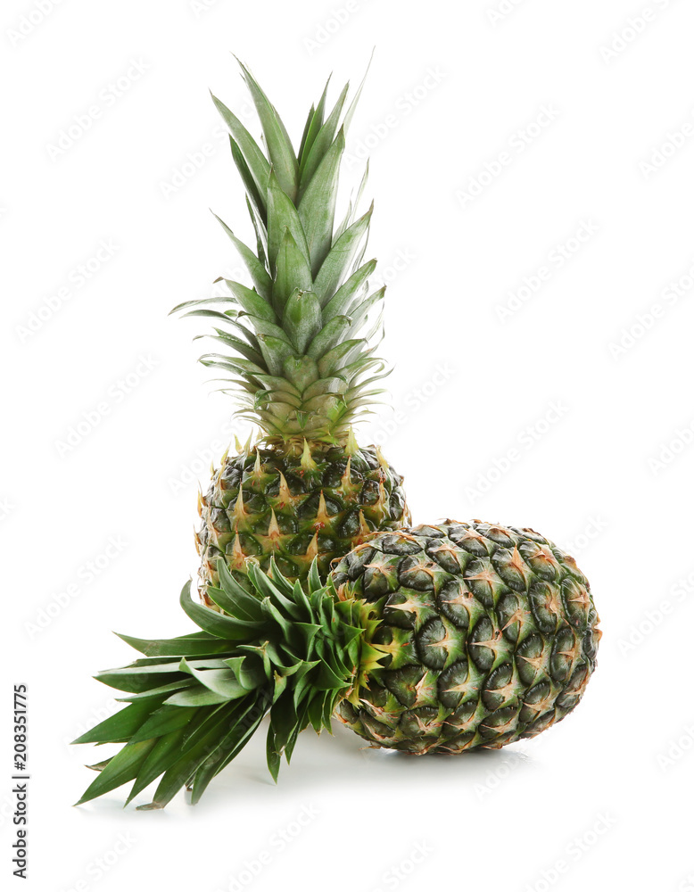 Fresh pineapples on white background