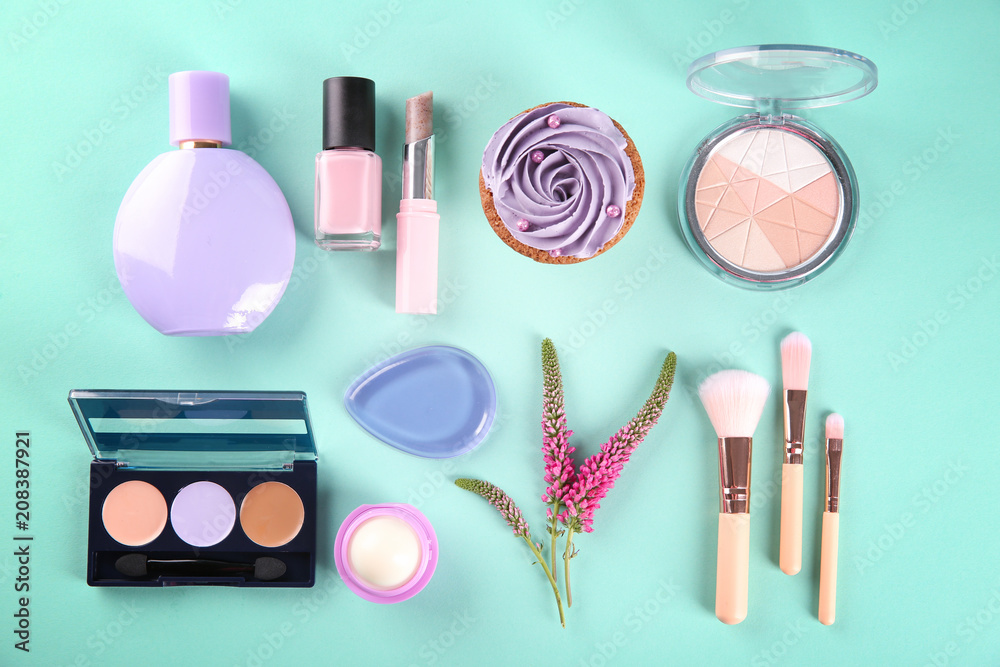 Flat lay composition with cosmetic products on color background