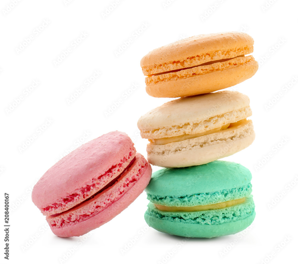 Delicious colorful macarons on white background