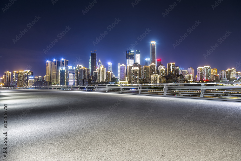 Panoramic skyline and buildings with empty road，chongqing city at night