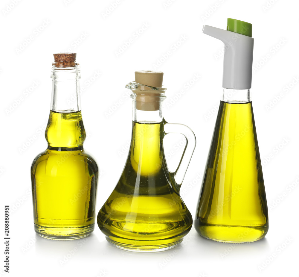 Glassware with olive oil on white background