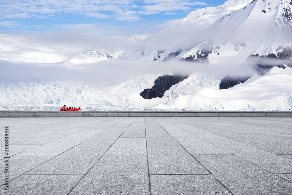 empty brick ground with sonw mountain as background