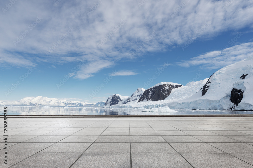 empty brick ground with sonw mountain as background