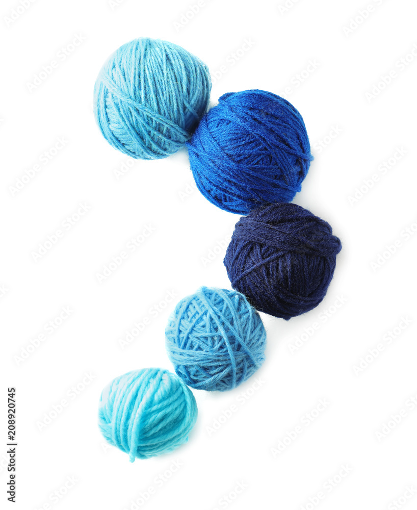 Balls of knitting yarn on white background