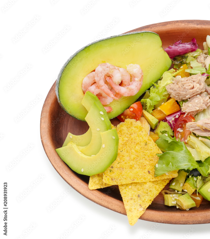 Plate of tasty salad with ripe avocado on white background