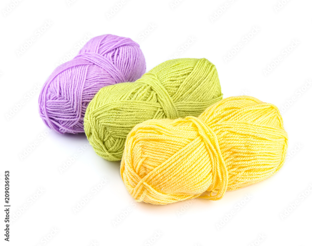 Colorful knitting yarn on white background