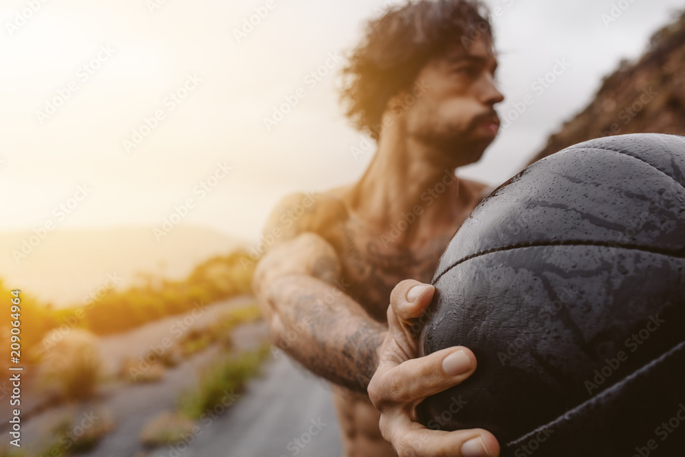 Sportsman exercising outdoors on a rainy day.