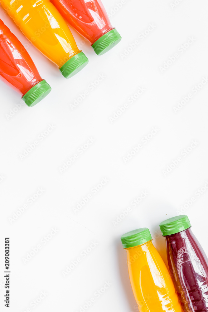 fruit juice in plastic bottle on white table top view mock-up