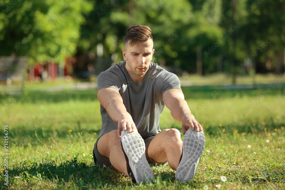 Sporty man training in park