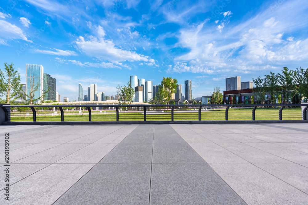 empty square with panoramic city skyline