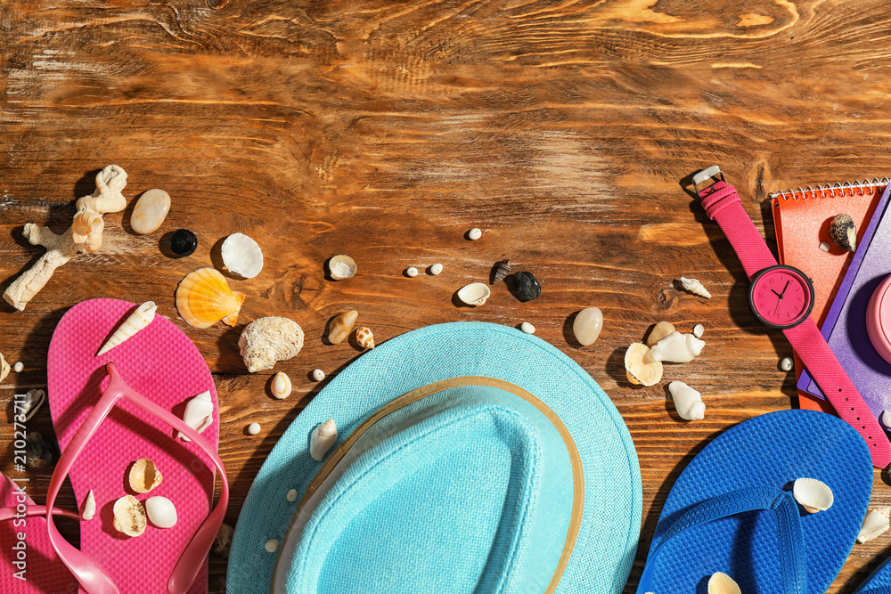 Composition with beach items on wooden background