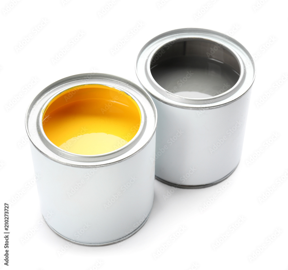 Cans of paint on white background