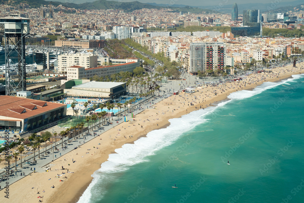 Aerial view of Barcelona, Barceloneta beach and Mediterranean sea in summer day at Barcelona, Spain.