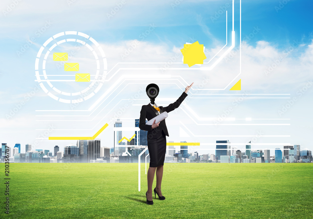 Camera headed woman standing on green grass against modern cityscape